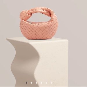 Looks Like Summer peach leather purse, with tags.